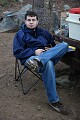 Charles relaxes in my folding BMW chair.