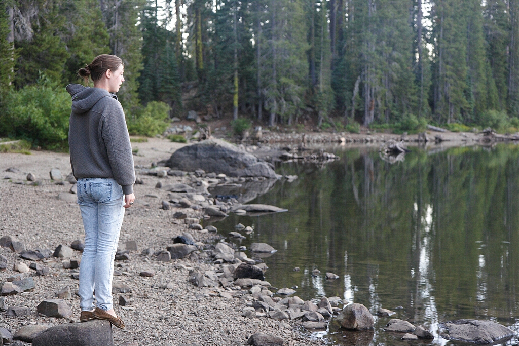 Sarah looks for fish (or bugs) or whatever