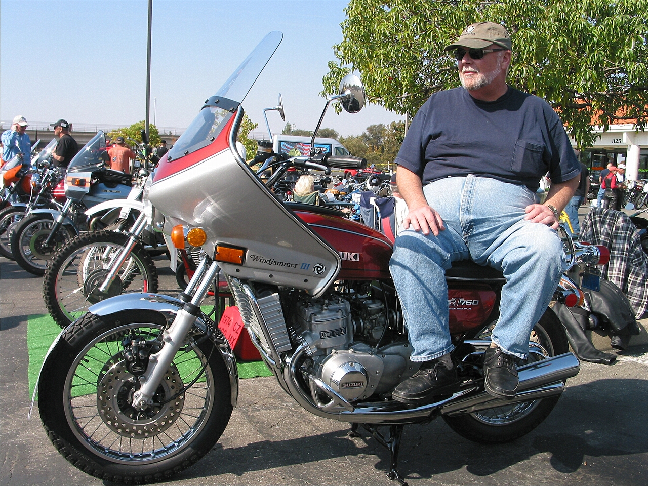 Proud owner of this early water cooled 2 stroke Suzuki - he bought it new - stripped it down and did a fabulous restoration.