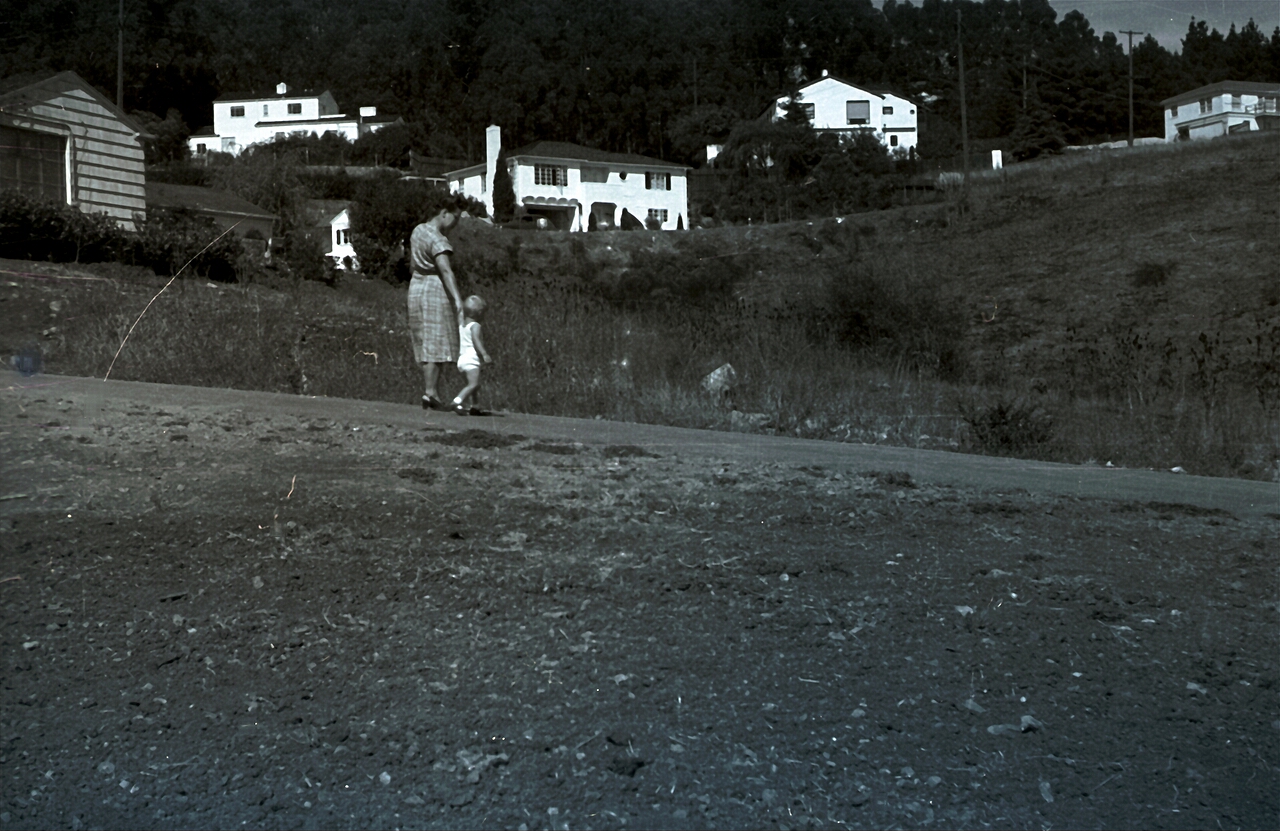 This is our lot before grading.  My mom and I are making a survey.