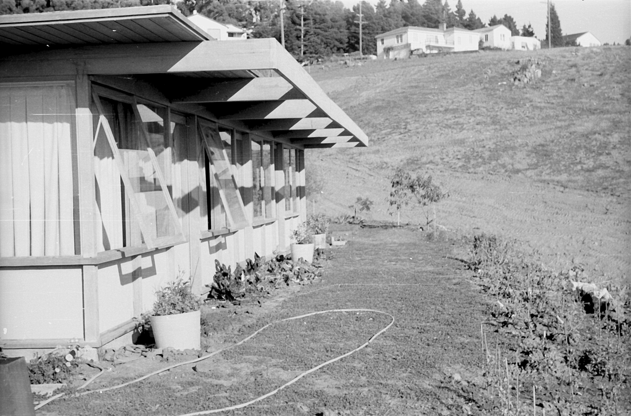 The south side of the house, before expansion and before the south walks and hedge were in place.