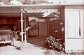 The entryway and carport - showing our '49 Ford, nicknamed "Betsy."